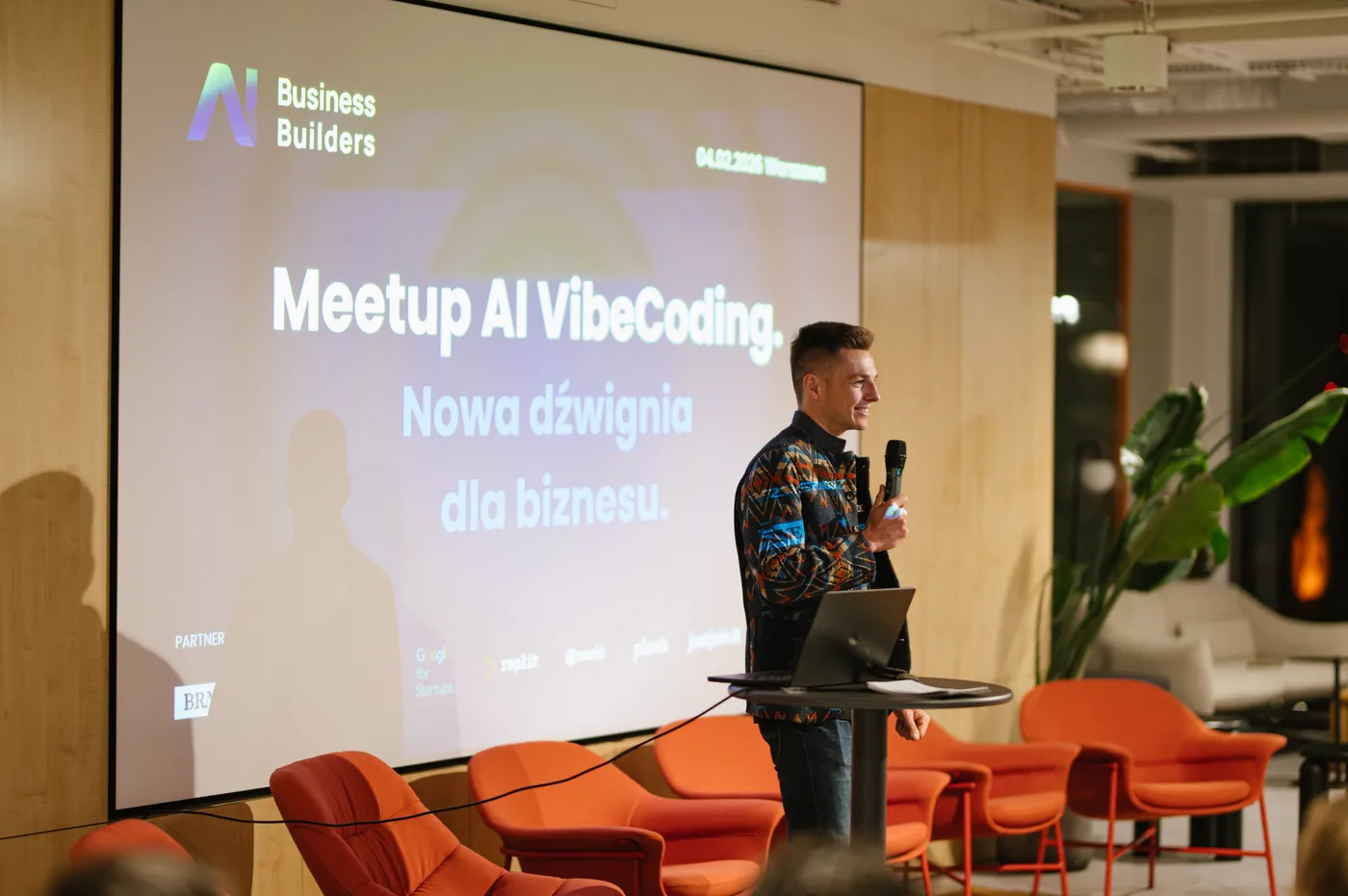 Igor Pielas on stage at an AI meetup
